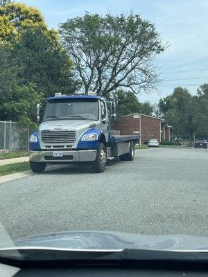Laser flatbed truck doing business off of 83rd and Glenwood Street dangerously park by 83rd for cars coming around the corner overnight.