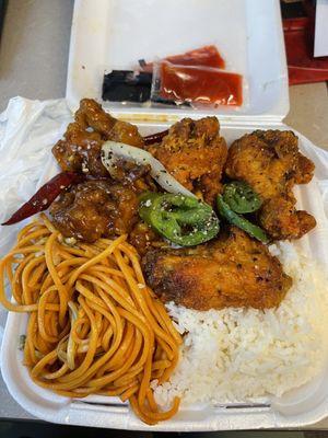 2 Item Combo: half white rice, half noodles, sesame chicken, fried chicken with salt and pepper.