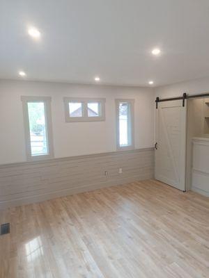 Same big empty room with new LED lighting.