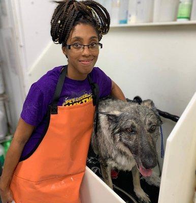 Deon splashing this fluffy baby around for bathtime!