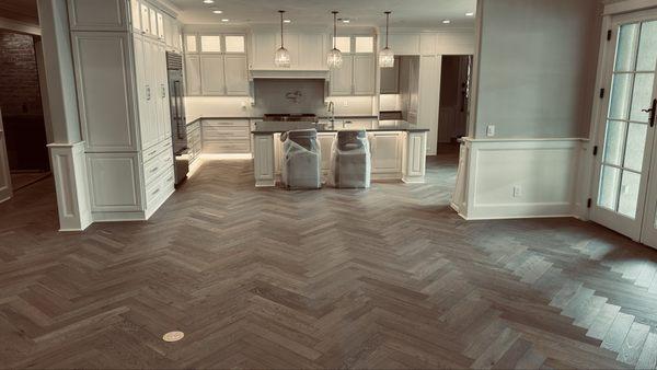 Oak herringbone hardwood floor.