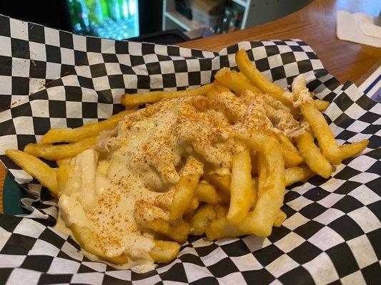 She Fries Basket of our crispy fries smothered in our house made she crab soup and finished with Old Bay