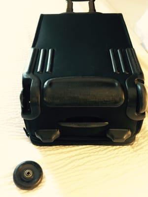 Broken Tumi luggage courtesy of American airlines!