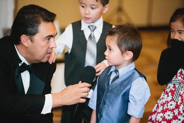 DJ Don doing a funny interview with the kids at our wedding about things like "what's the meaning of love?" turned out awesome!