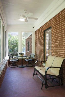 Seville's 3-seasons reading porch overlooks a stream and mature trees. Enjoy!