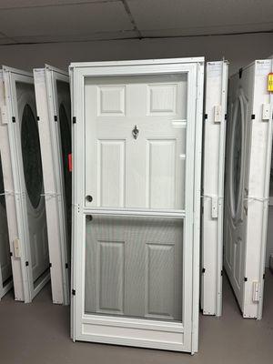 Door with knocker and glass storm door