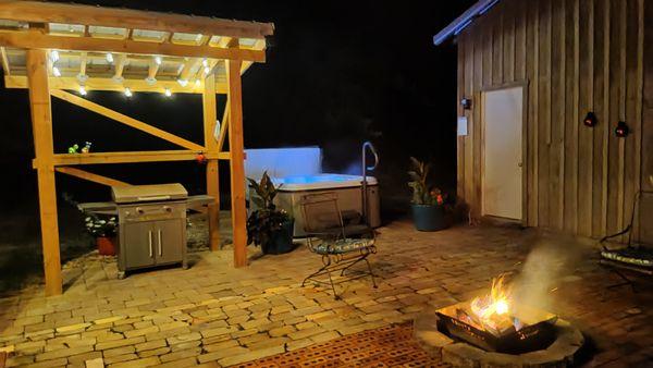 Patio at night - Blackstone Grill, Hot tub, fire pit