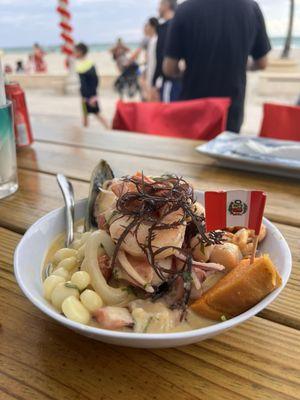 Mixed ceviche in yellow pepper sauce