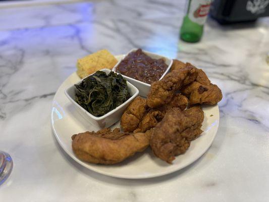 Chicken strips collard greens red beans and rice and cornbread