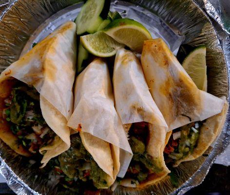 Carne enchilada and al pastor tacos
