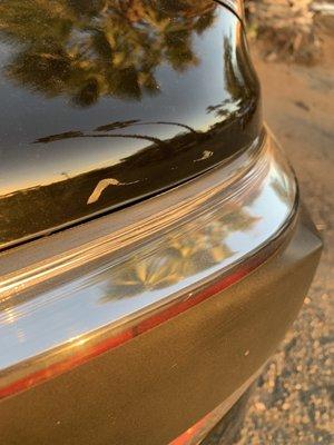 This wasn't above my taillight before I dropped my car off with them unfortunately. I cannot get it off or rub it out