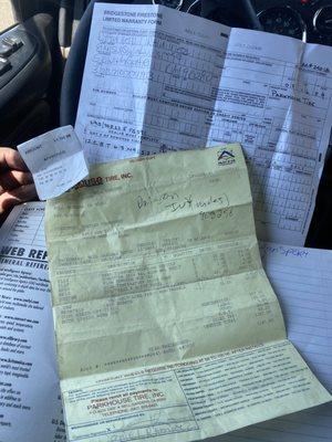 Yellow and lil receipts for new tires and paper of trying to claim warranty on no good work