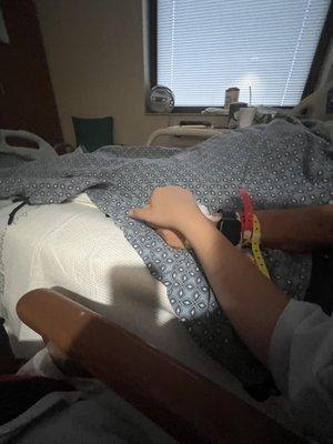 This photo is me holding my grandmas hand as she cried in pain