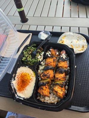 Chicken Kabob Plate with a side of hummus and tabouli.