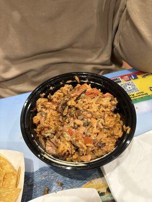 My boyfriend had the KC BOWL with shrimp and carne asada. Melon water. Free chips and homemade salsa