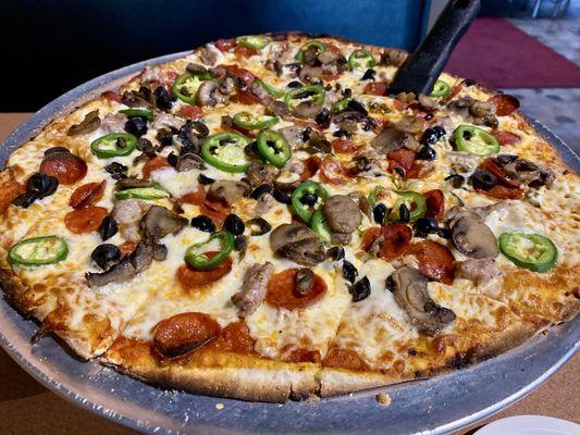 Build your own with ingredients offered. Jalepeno, black olive, mushroom, italian sausage & pepperoni.