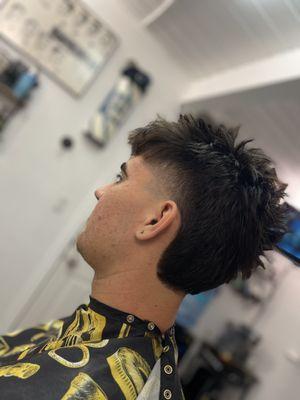 Bro, a mid bald taper textured mullet, Rounded back. Might be exactly what you may be looking for, Always fun