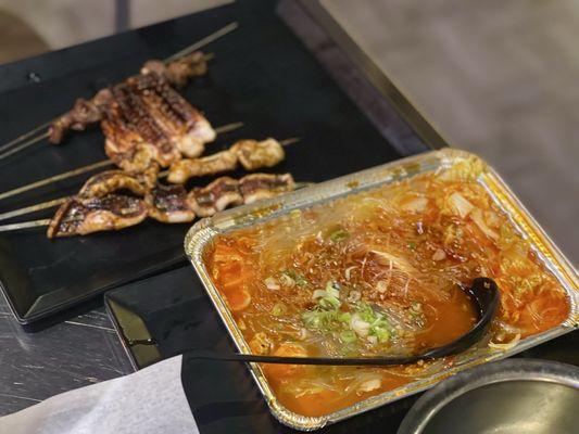 Beef skewer, squid skewers in back. Clam vermicelli noodle in front of