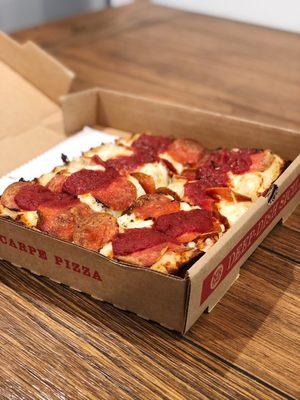 Deep dish pepperoni pizza