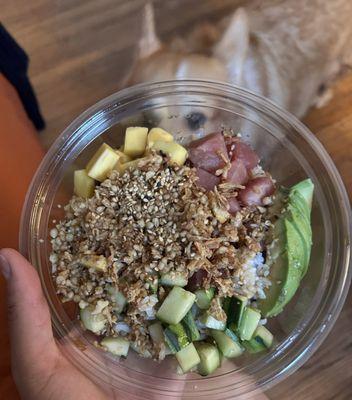 One protein- white rise, Tuna, cucumber, mango, avocado, crispy onions, tempura crumbs, sesame, with punzo sauce.