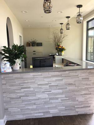 Our new front desk at our new location!