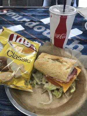 #4 ham and turkey sour dough sub with chips and a drink