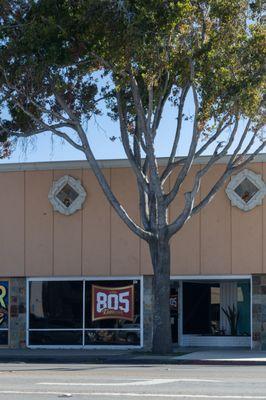 Front entrance is on West Main Street with parking in front on the street, on pine Street or in the back plaza