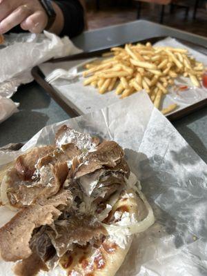Gyro sandwich and fries