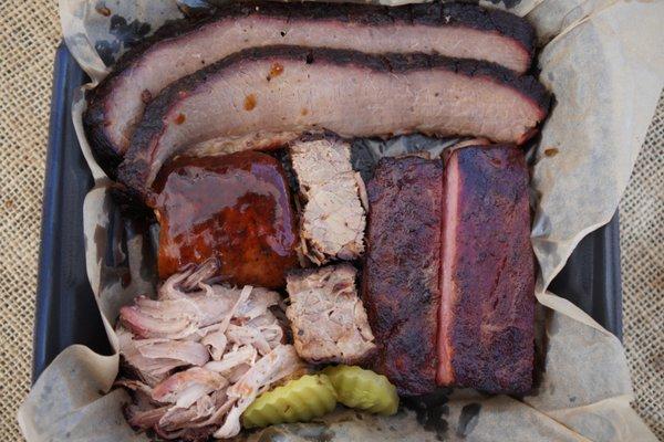 Judge's Box: 2 slices of brisket, 2 rib bones, 2 burnt ends, 1 chicken, pulled pork, pickles