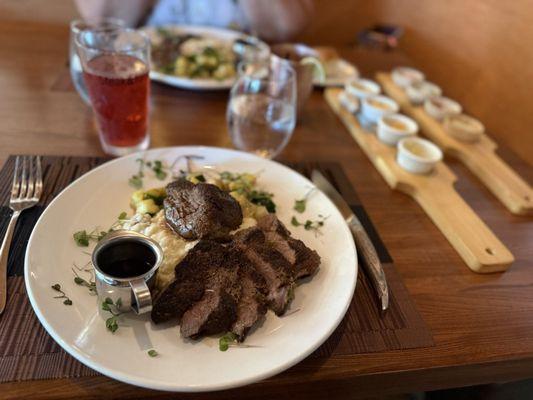 Exotic duo camel and bison with smashed potatoes, zucchini,yellow squash spring onions and asparagus.