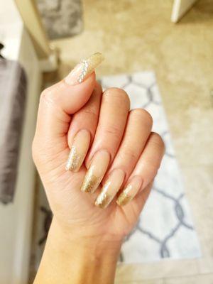 Deep French with metallic gold, stones on thumb