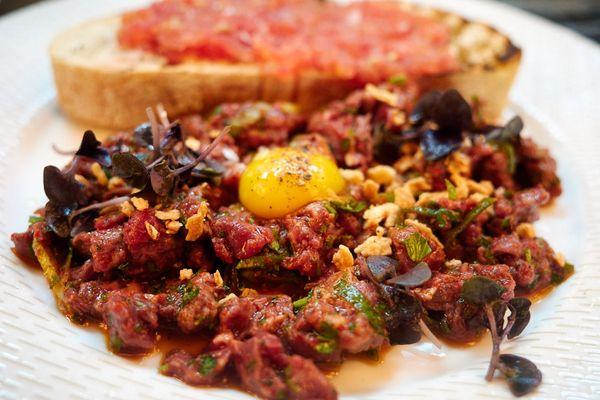 Wagyu beef tartare - catalan spices, spicy garlic, quail egg, pan con tomate