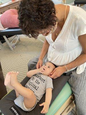 My son getting adjusted by Dr. Tara.