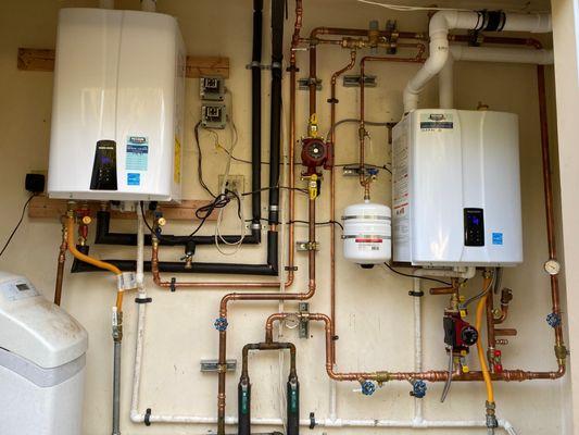 Two Navien tankless water heaters in one home