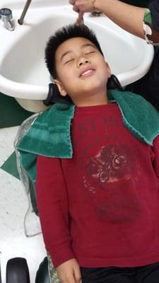 My brother getting a shampoo!