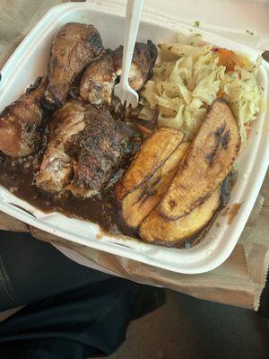 This is a half dark with extra gravy, plantains and cabbage