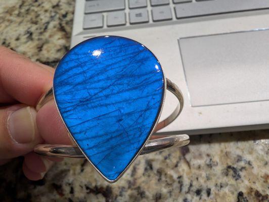 Beautiful rich royal blue labradorite cuff bracelet with some flash when it catches the light.