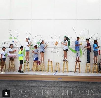 What do you do with a huge class of crazy talented students? Give them some paint, brushes,and watch them unfold.