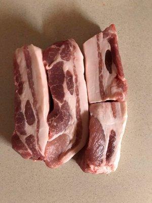 The fat cap should have trimmed and not hidden by the packaging.