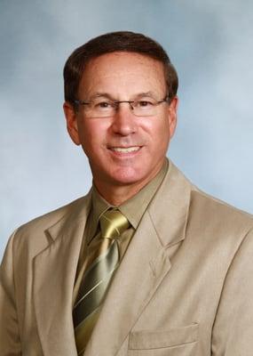 Dr. Leon Remis