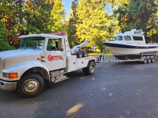 Meridian Towing towing a boat on a trailer