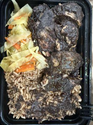 Jerk Chicken with rice and beans, steamed veggies.