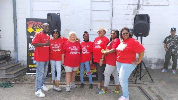 Some owners, staffers and Kiss Fm in background. Celebrating our 1st Anniversary.