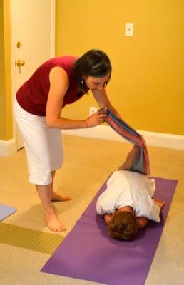 Child's Pose with the Rainbow Peace Scarf