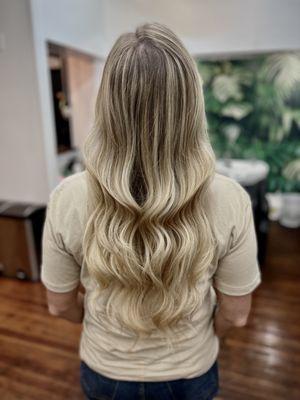 Blonde balayage with styled waves