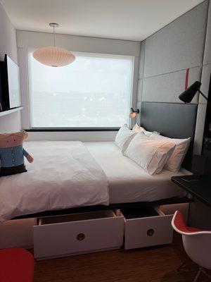 Width of the room is the size of a bed