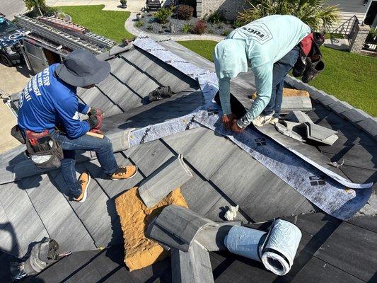 The Ridge cap is getting new water barrier and 5" screw for better attachment.