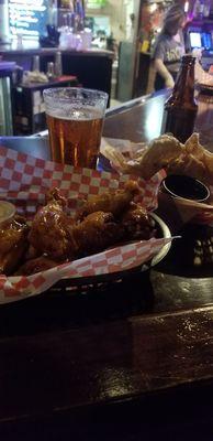Wings, pork rinds, and beer