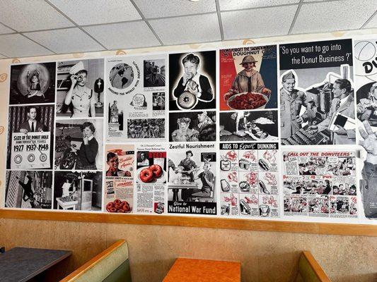 Wall that pays homage to the history of the shop and donuts.