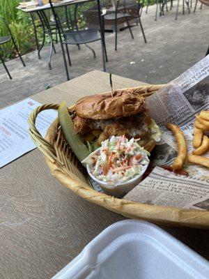 Giant Fried Chicken Sandwich with cole slaw and fries.
